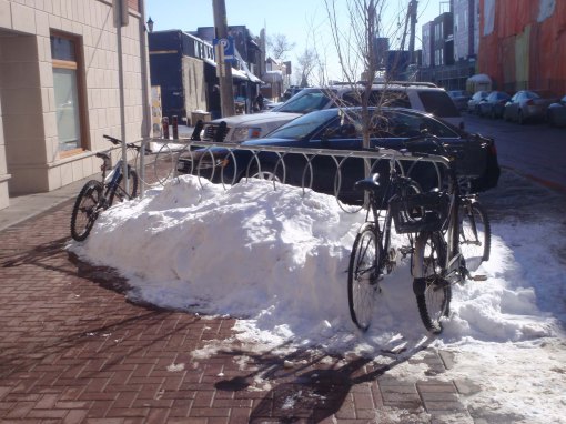 Your business claims to be bike-friendly, yet you use your bike rack to pile snow on...